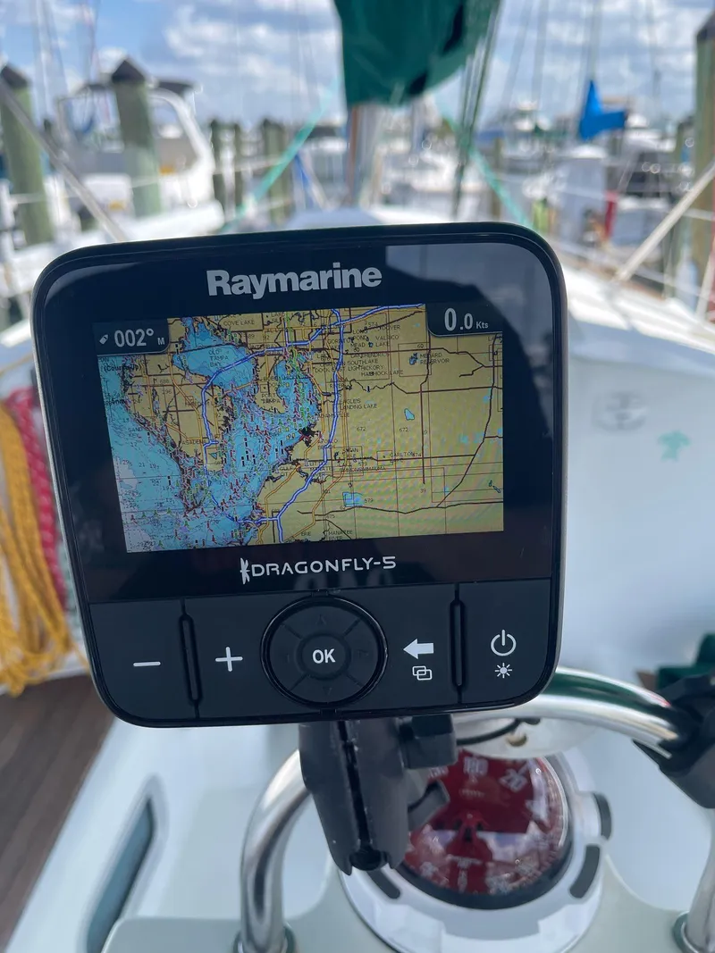 Slide: The Image of Raymarine Dragonfly-S GPS on 2000 Beneteau Oceanis 311 sailboat, docked with marina view. - 31