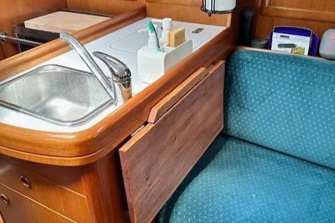 Slide: The Image of Beneteau Oceanis 311 yacht interior with sink and seating, 2000 model. - 42