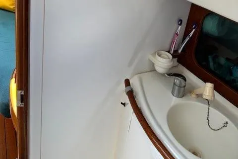 Slide: The Image of Bathroom sink area on a 2000 Beneteau Oceanis 311 sailboat. - 43