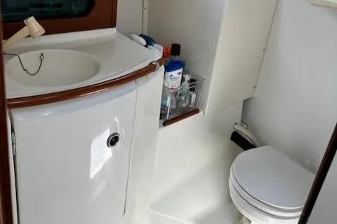 Slide: The Image of Beneteau Oceanis 311 yacht bathroom with sink and toilet, 2000 model. - 47