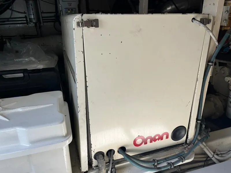 Slide: The Image of Onan generator in 1988 Hatteras 52 Convertible engine room. - 40