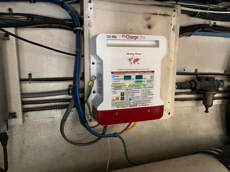 Slide: The Image of Battery charger in 1988 Hatteras 52 Convertible engine room, featuring Sterling Power ProCharge Ultra. - 44