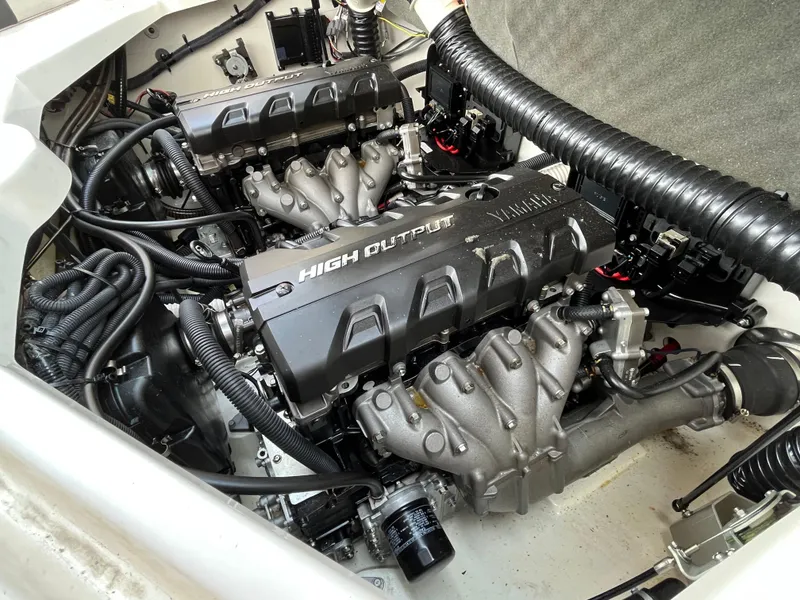 Slide: The Image of 2018 Yamaha Boats 212X engine compartment showcasing high output engines and components. - 26