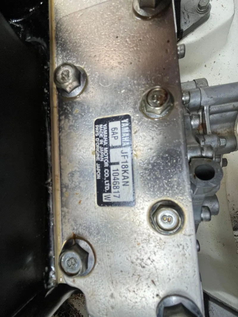 Slide: The Image of Close-up of a Yamaha 212X 2018 engine part with serial number plate. - 27