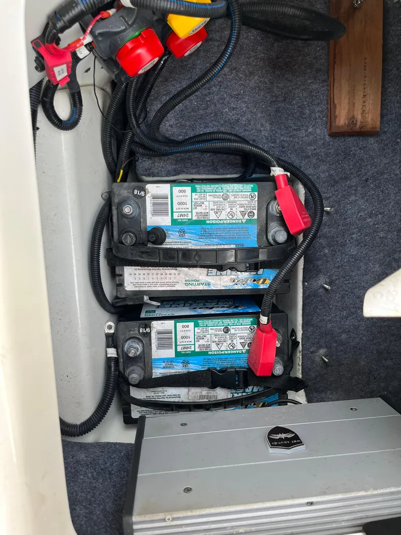 Slide: The Image of Yamaha Boats 2018 212X battery compartment with wiring and components. - 30