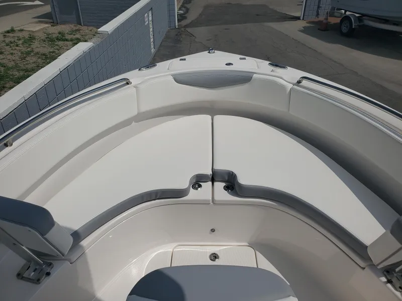 Slide: The Image of 2022 Robalo R222 Center Console boat with spacious bow seating area. - 12