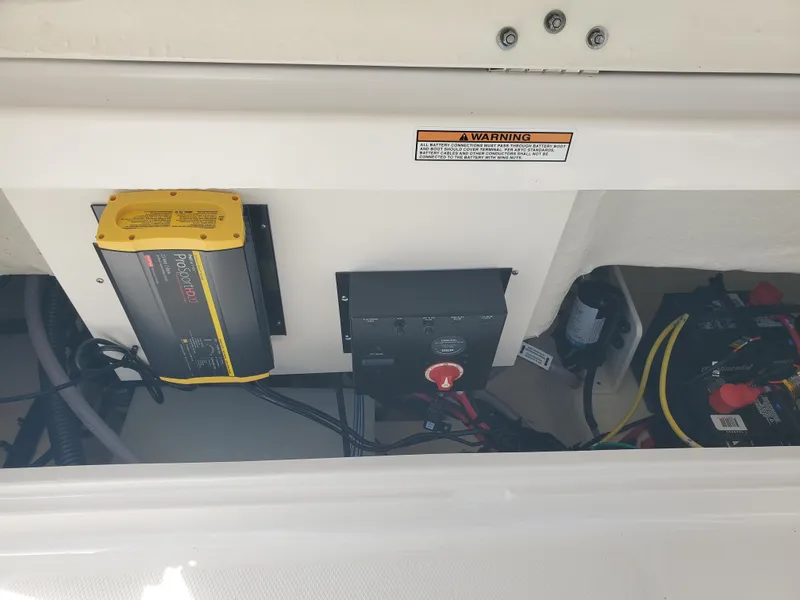 Slide: The Image of Electrical components inside a 2022 Robalo R222 Center Console boat. - 19