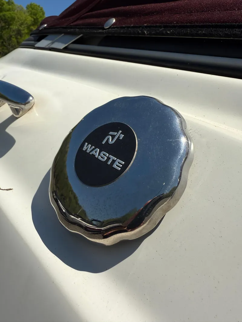Slide: The Image of Chrome waste cap on 2013 Stingray 235 CR boat. - 21