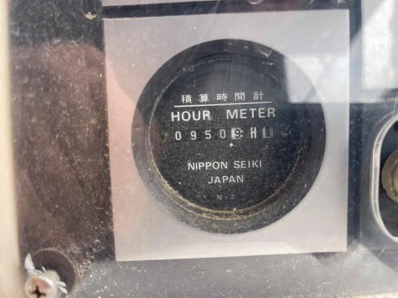 Slide: The Image of Hour meter reading 9509 hours on a 2004 Hunter 44 Deck Salon, Nippon Seiki Japan. - 25