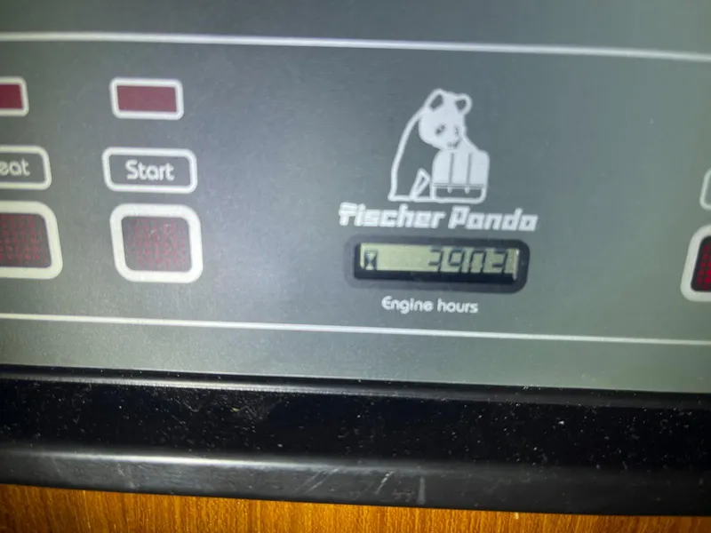Slide: The Image of Fischer Panda engine hours display on 2004 Hunter 44 Deck Salon yacht. - 26