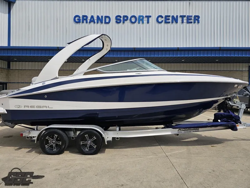 Slide: The Image of 2011 Regal 2500 Bowrider boat on trailer at Grand Sport Center. - 3