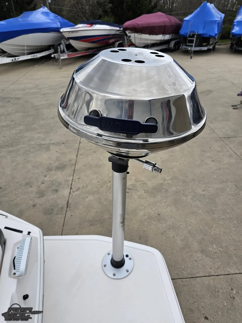 Slide: The Image of Stainless steel grill mounted on a 2011 Regal 2500 Bowrider boat deck. - 41