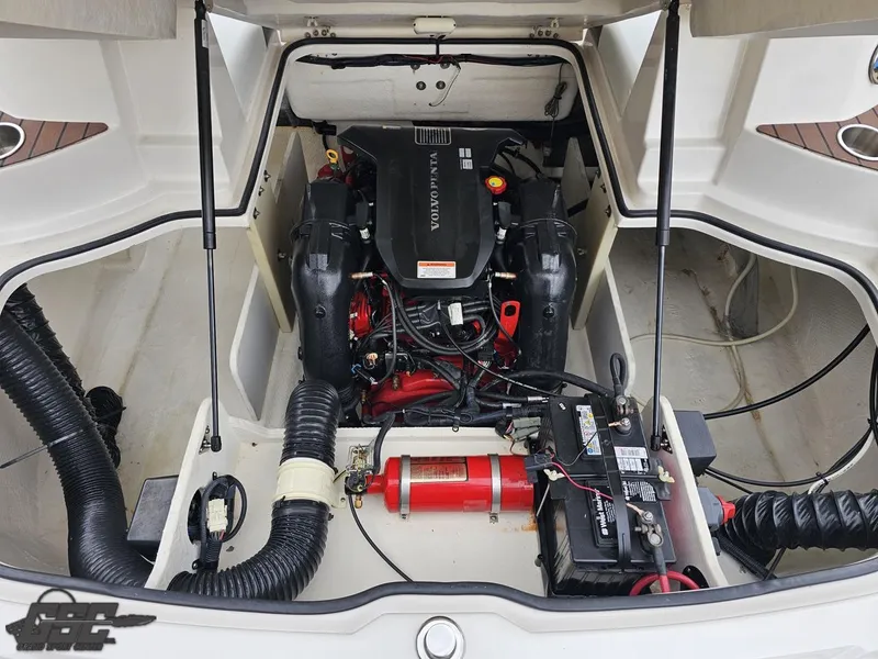 Slide: The Image of Engine compartment of a 2011 Regal 2500 Bowrider with Volvo Penta engine and battery. - 45