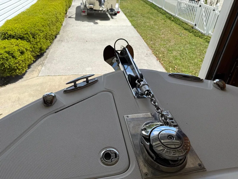 Slide: The Image of Bow of a 2012 Edgewater 245 CX boat with anchor and winch system. - 18