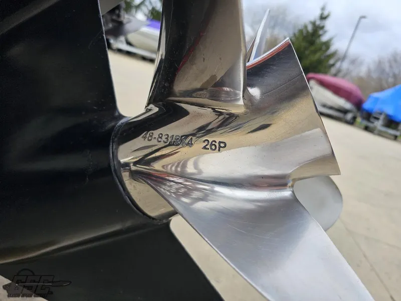Slide: The Image of Close-up of a 2005 Baja 25 Outlaw boat propeller with engraved specifications. - 36