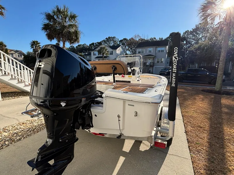 Slide: The Image of 2023 Sea Pro 172 Bay boat with powerful outboard motor, parked outdoors. - 7