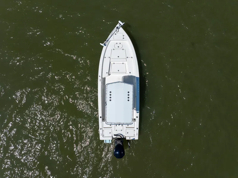 Slide: The Image of Aerial view of 2018 Pathfinder 2400 TRS boat on green water. - 12