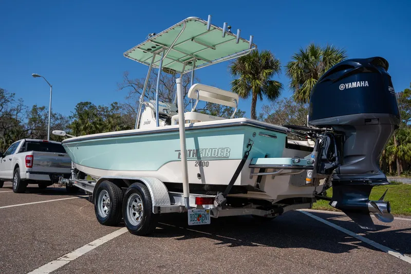 Slide: The Image of 2018 Pathfinder 2400 TRS boat on trailer with Yamaha outboard motor. - 16