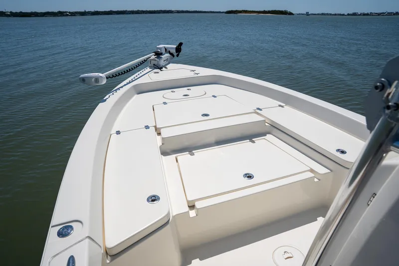 Slide: The Image of Bow of 2018 Pathfinder 2400 TRS boat on calm water. - 22