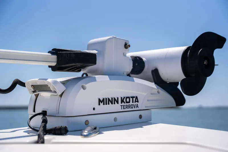 Slide: The Image of Minn Kota Terrova trolling motor on 2018 Pathfinder 2400 TRS boat, clear sky background. - 25