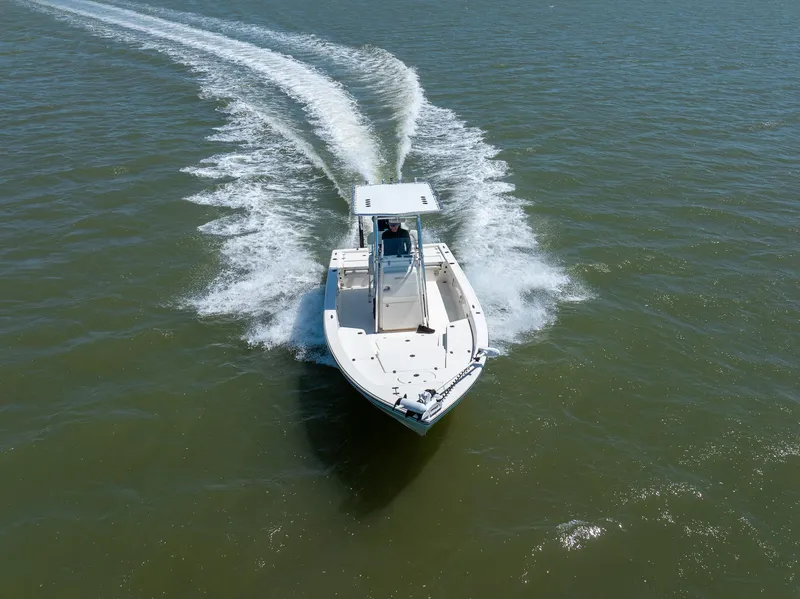 Slide: The Image of 2018 Pathfinder 2400 TRS boat cruising on open water, aerial view. - 3