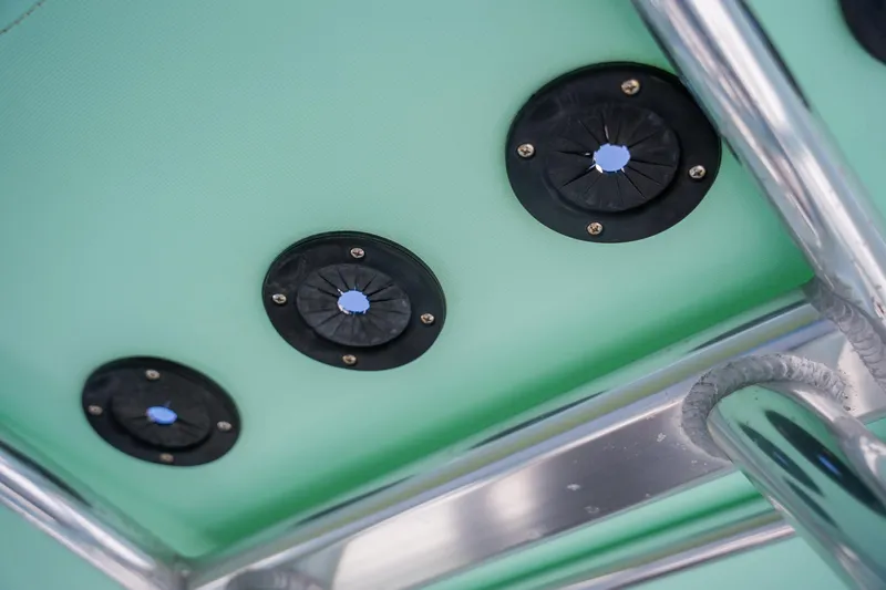 Slide: The Image of 2018 Pathfinder 2400 TRS boat detail showing rod holders and metal framework. - 49