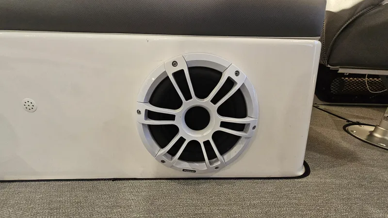 Slide: The Image of 2023 Yamaha AR250 boat speaker system on a sleek white panel. - 24