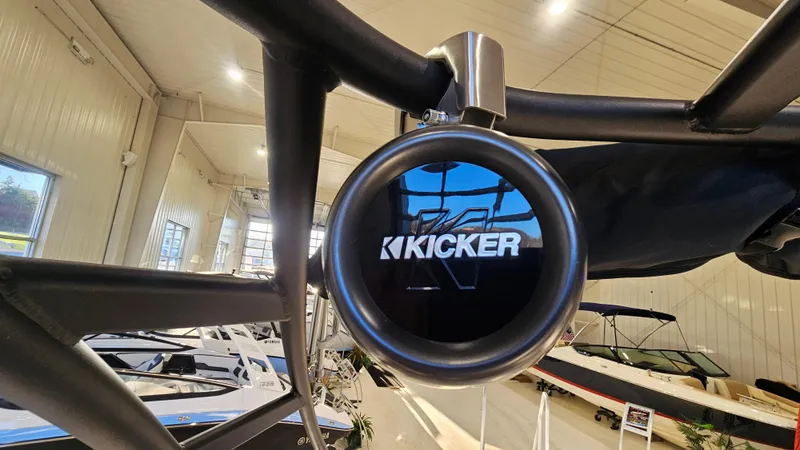 Slide: The Image of 2023 Yamaha AR250 boat with Kicker speaker in showroom. - 25