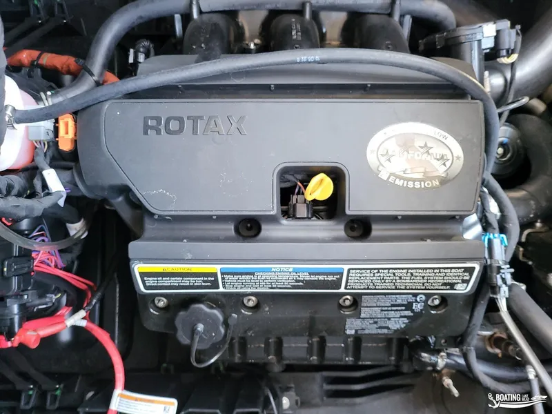 Slide: The Image of 2023 Sea-Doo Switch Cruise 21 engine, featuring Rotax technology and low emission design. - 23