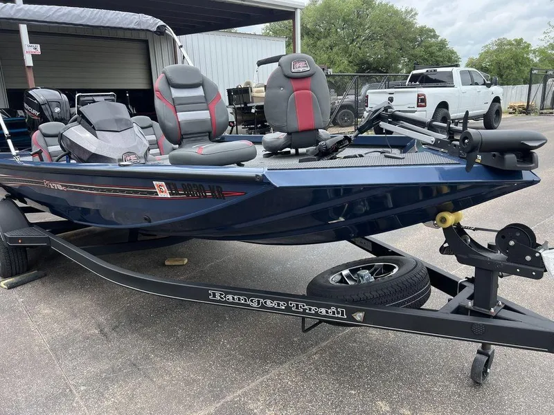 Slide: The Image of 2022 Ranger RT178C boat on trailer, featuring sleek design and comfortable seating. - 19
