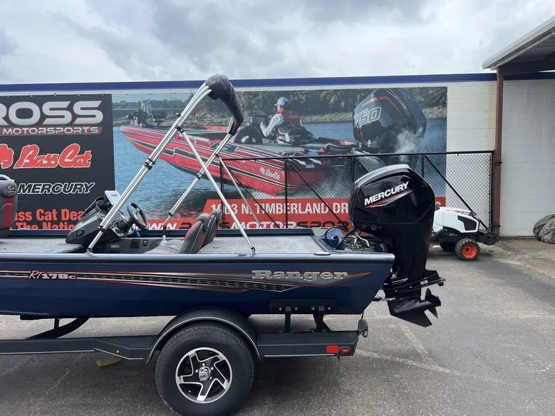 Slide: The Image of 2022 Ranger RT178C boat with Mercury engine displayed at dealership. - 3