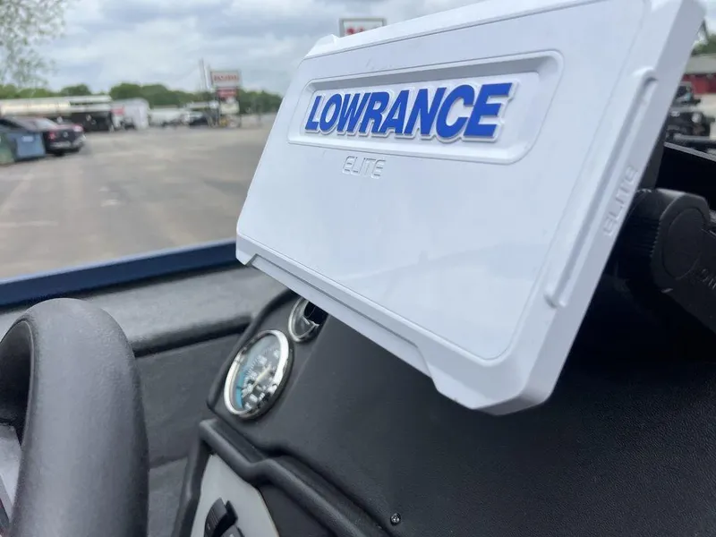 Slide: The Image of Lowrance Elite device on 2022 Ranger RT178C dashboard, outdoor setting. - 33