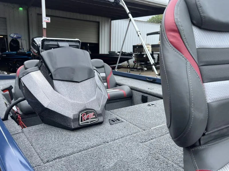 Slide: The Image of 2022 Ranger RT178C boat interior with gray and red seating, showcasing modern design. - 35