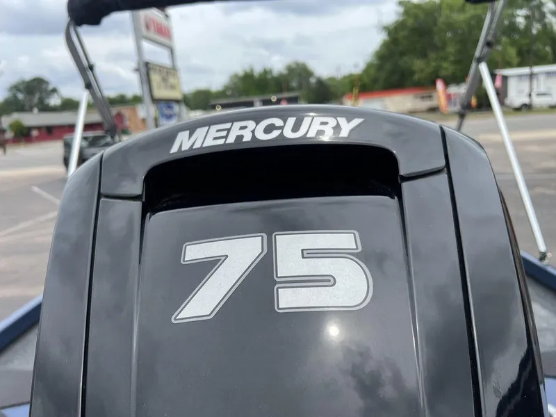 Slide: The Image of Mercury 75 horsepower engine on 2022 Ranger RT178C boat, outdoor setting. - 42