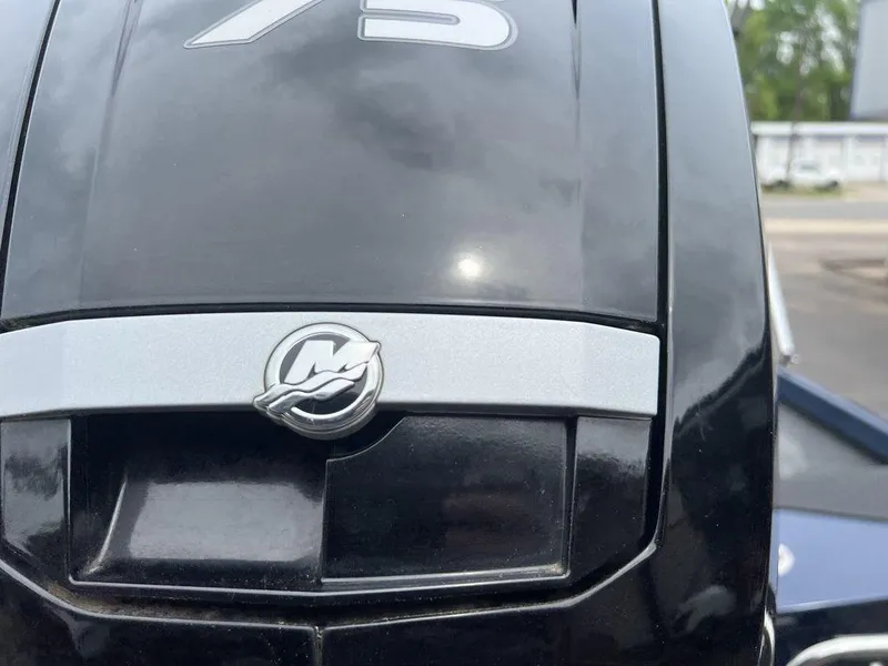 Slide: The Image of Close-up of a 2022 Ranger RT178C boat engine with Mercury logo. - 47