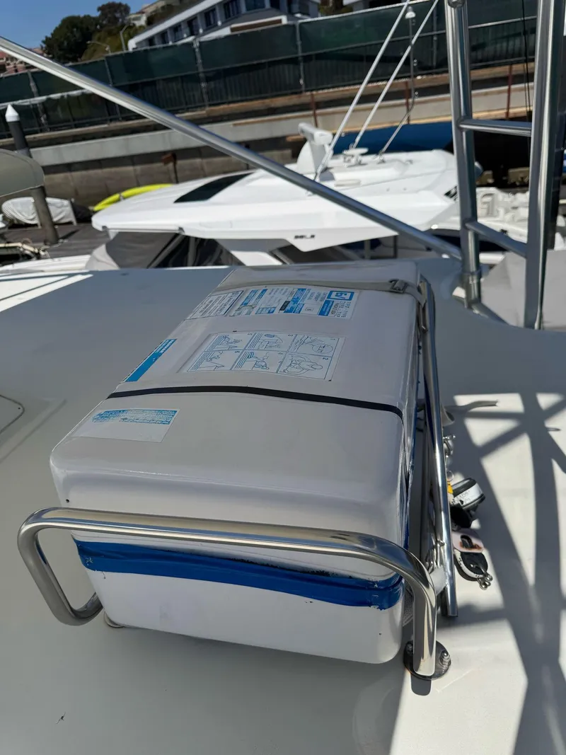 Slide: The Image of 1998 Cabo 35 Express boat deck with mounted equipment. - 29