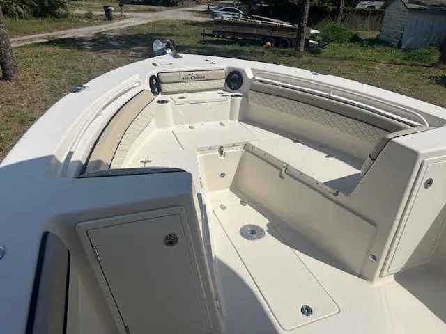 Slide: The Image of 2020 Sea Chaser 30 HFC CC boat interior with spacious seating and storage compartments. - 18