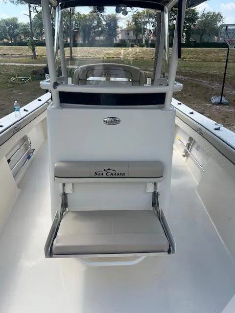Slide: The Image of 2020 Sea Chaser 30 HFC CC boat interior with seating and console. - 20