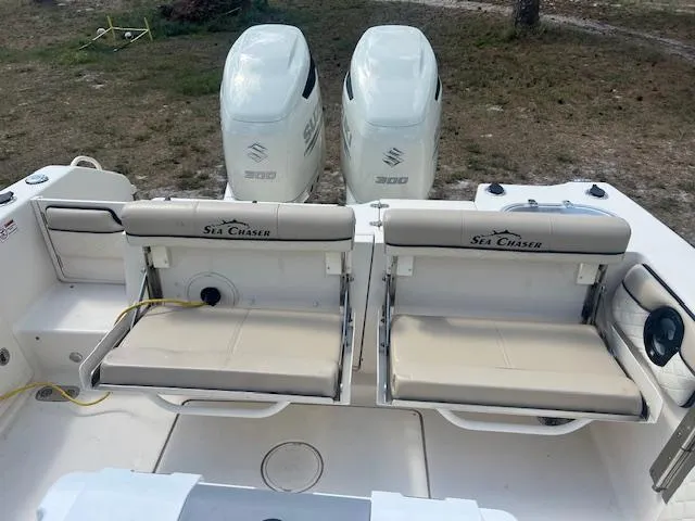 Slide: The Image of 2020 Sea Chaser 30 HFC CC boat with dual Suzuki engines and foldable seating. - 21