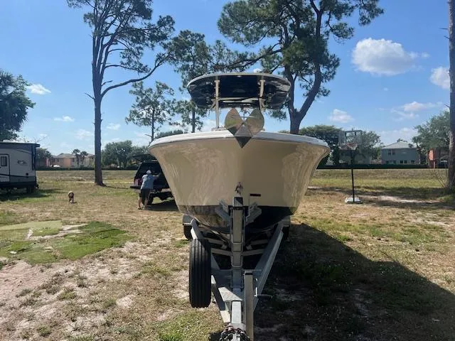 Slide: The Image of 2020 Sea Chaser 30 HFC CC boat on trailer, parked outdoors under clear sky. - 6