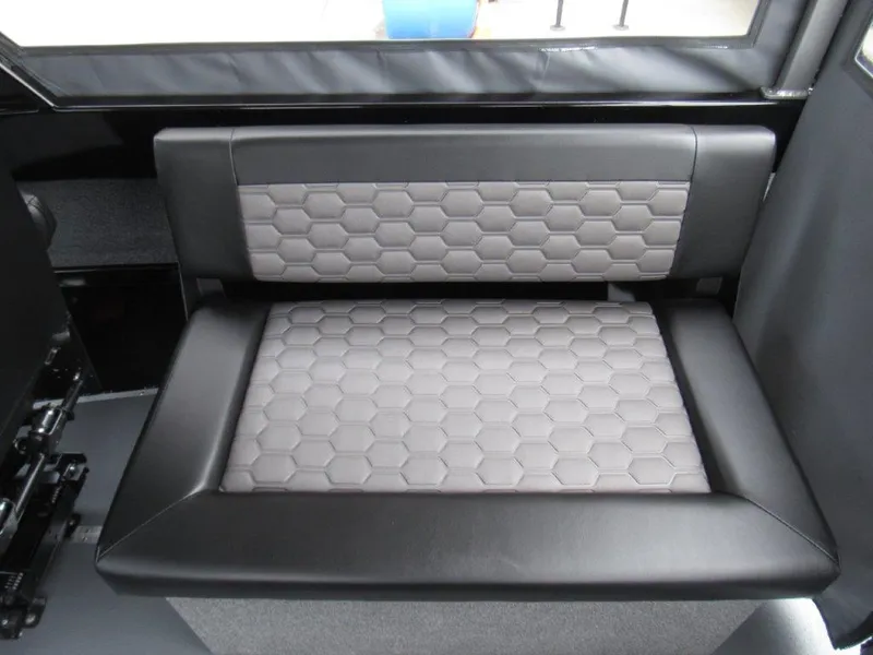 Slide: The Image of 2025 North River 23 SEAHAWK RTF interior seat with hexagonal pattern upholstery. - 15