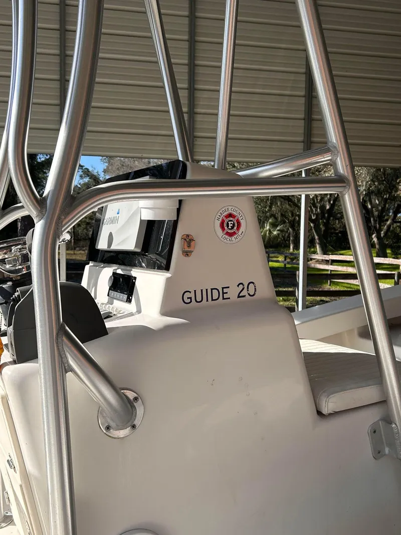 Slide: The Image of 2014 Andros Guide 20 boat with metal framework and control panel. - 5
