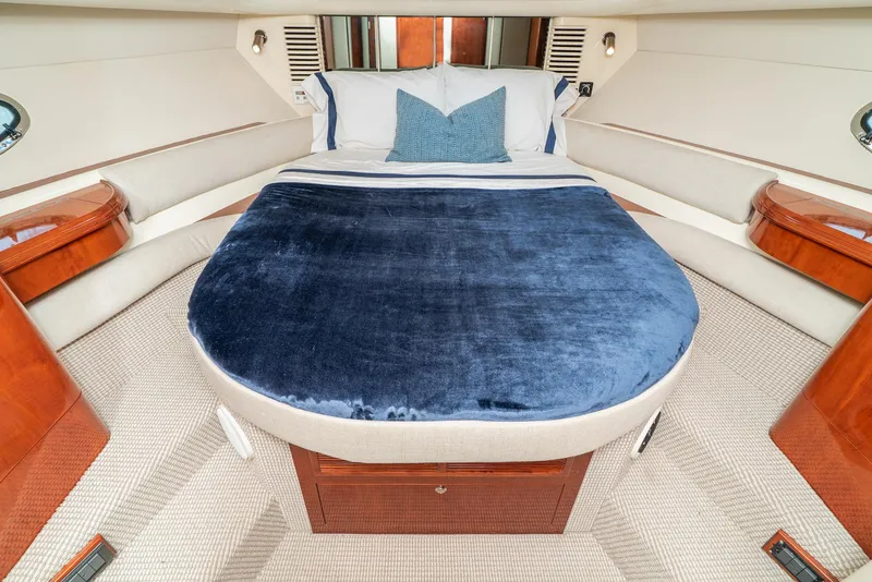 Slide: The Image of Luxurious cabin interior of 2000 Fairline 48 Targa yacht with plush bedding. - 40