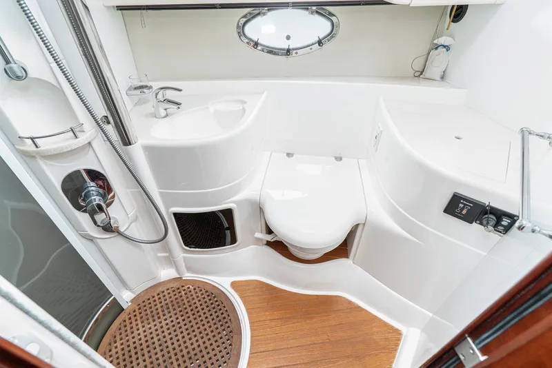 Slide: The Image of Luxurious bathroom in 2000 Fairline 48 Targa yacht with modern fixtures and wooden flooring. - 45