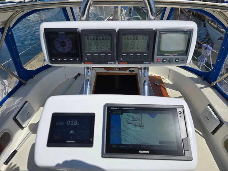 Slide: The Image of Cockpit of 1985 Pearson 385 sailboat with Garmin navigation displays. - 12