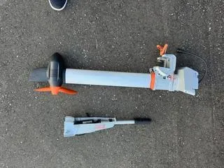 Slide: The Image of Pearson 385 boat motor parts on asphalt, 1985 model. - 34