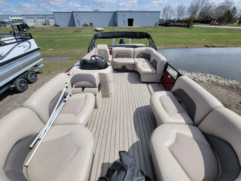 Slide: The Image of 2021 Landau 220 Atlantis pontoon boat with spacious seating and modern design. - 10