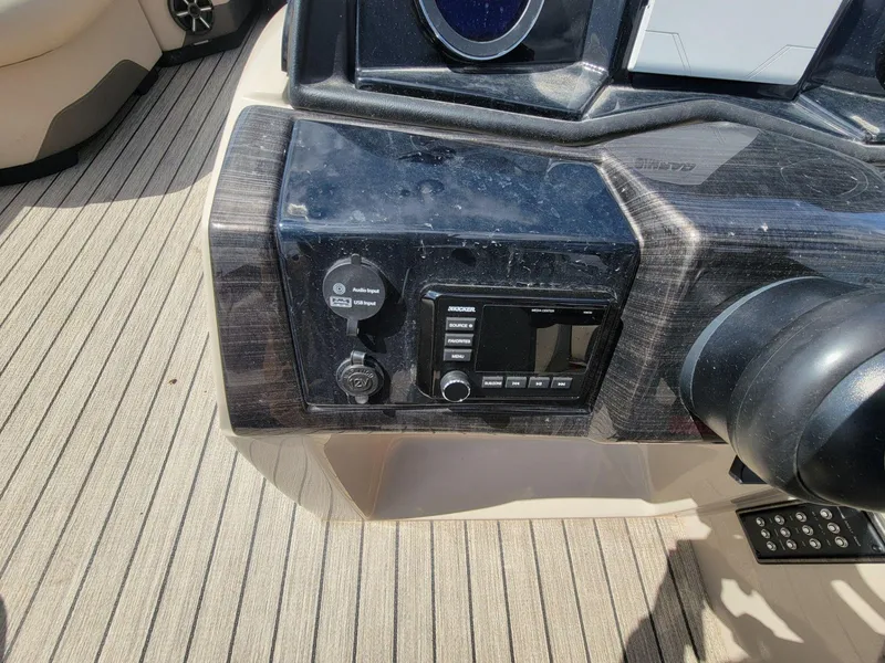 Slide: The Image of Control panel of 2021 Landau 220 Atlantis boat with audio system and USB input. - 19