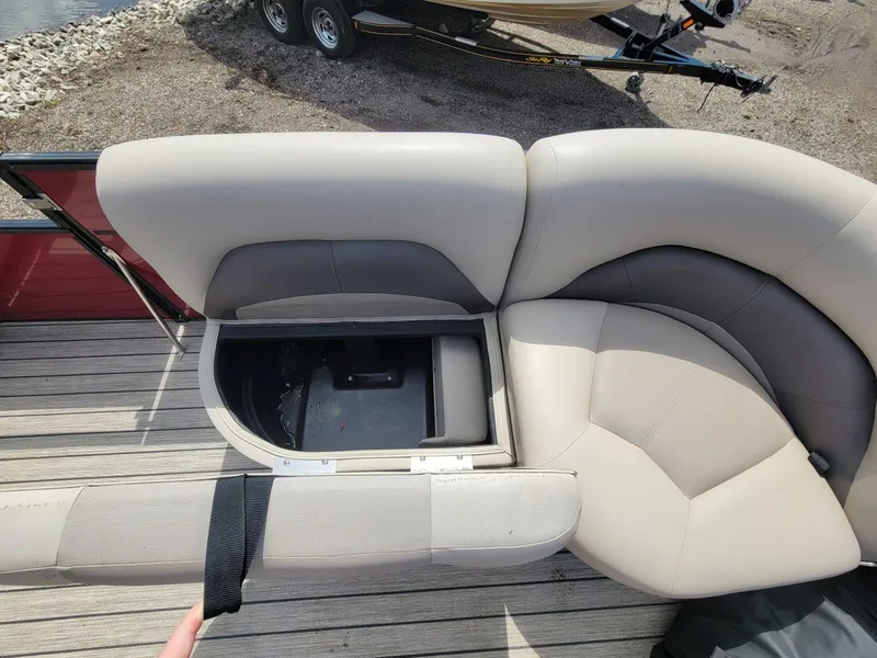 Slide: The Image of 2021 Landau 220 Atlantis boat with open storage compartment on deck. - 27