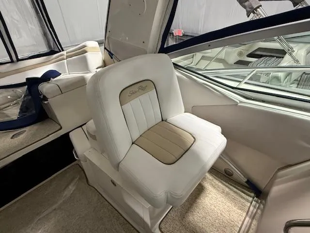 Slide: The Image of 2009 Sea Ray 350 Sundancer interior with plush seating and elegant design. - 9